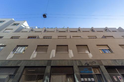 a tall building with a lot of windows at Leia Hospitality in Milan