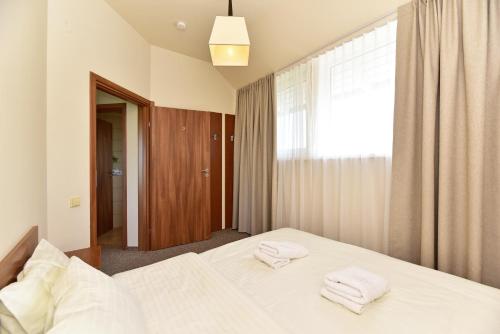 Cama o camas de una habitación en Cozy stay by Kaunas vila 9Vėjai