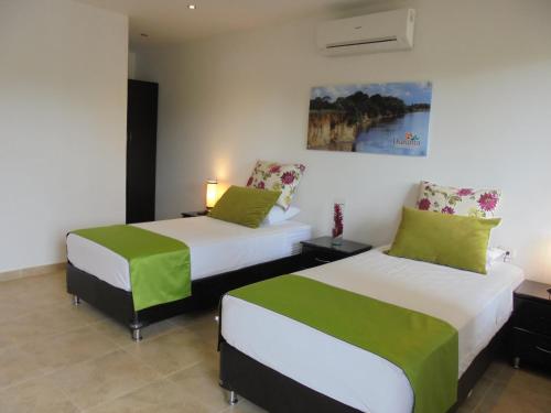 Ένα ή περισσότερα κρεβάτια σε δωμάτιο στο Hotel Boutique Duranta
