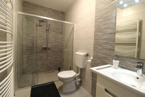 Koupelna v ubytování Apartmani i sobe Laganini