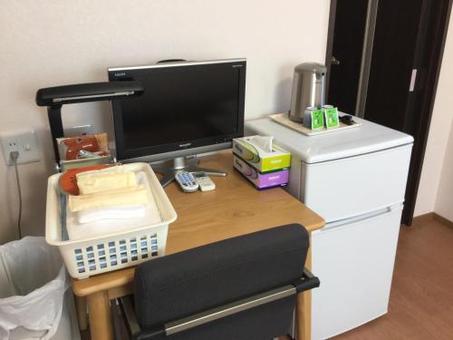 Cucina o angolo cottura di Business Inn Grandeur Fuchu