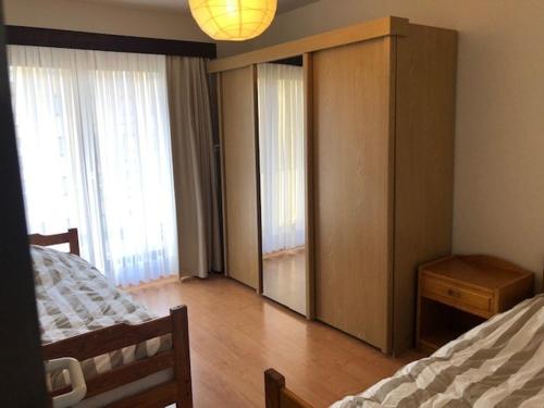 Postel nebo postele na pokoji v ubytování Zeedijk Koksijde