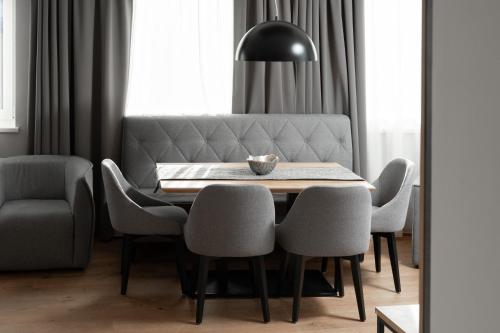 a dining room with a table and chairs at A Casa Elements in Serfaus