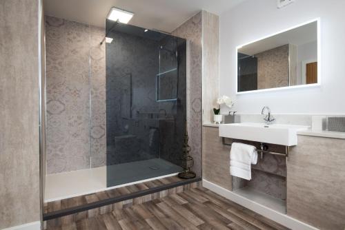 a bathroom with a shower and a sink at The Sheep Fold in Melrose