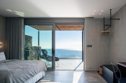 Ένα ή περισσότερα κρεβάτια σε δωμάτιο στο Kumo Villas