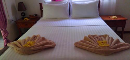 Katil atau katil-katil dalam bilik di Dan Zoranz Self Catering Guest House