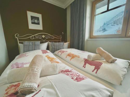 Letto o letti in una camera di Haus Wallis by stayFritz - Ski-In Ski-Out Apartments am Arlberg