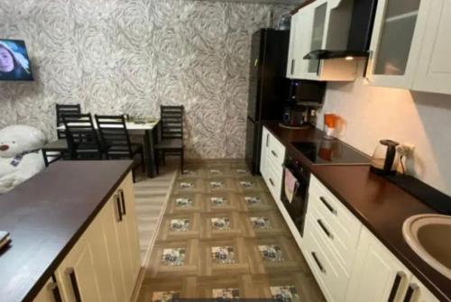 Kuchyň nebo kuchyňský kout v ubytování VIP apart 545