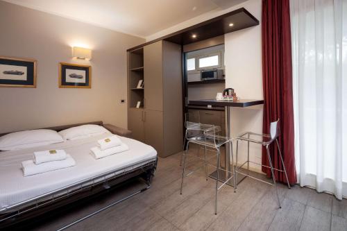 Postel nebo postele na pokoji v ubytování Best Western Plus Hotel Modena Resort