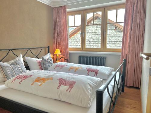 Letto o letti in una camera di Haus Wallis by stayFritz - Ski-In Ski-Out Apartments am Arlberg