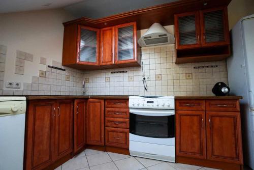 Kuchyň nebo kuchyňský kout v ubytování Apartamenty przy Sosnowej