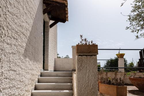a set of stairs leading up to a building at Casa Bianca in Licata