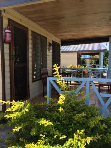 a blue picnic table on the porch of a house at Waya Lailai Eco Haven in Wayasewa Island