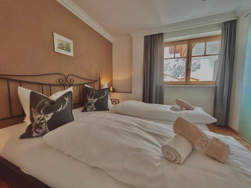 Letto o letti in una camera di Haus Wallis by stayFritz - Ski-In Ski-Out Apartments am Arlberg