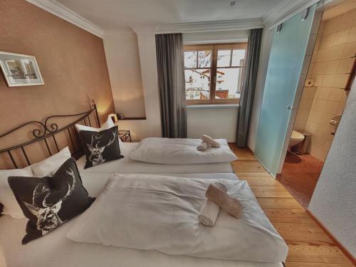Letto o letti in una camera di Haus Wallis by stayFritz - Ski-In Ski-Out Apartments am Arlberg