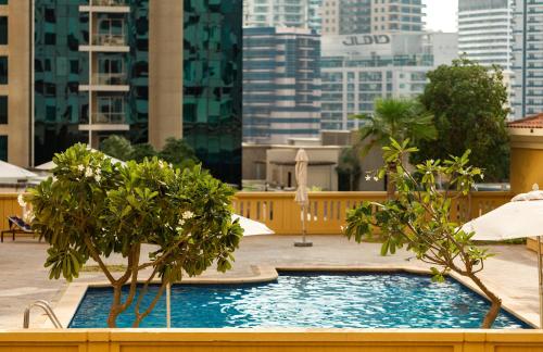 Piscina en o cerca de Happy ACADEMIA JBR