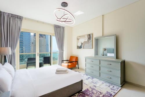 Postel nebo postele na pokoji v ubytování Livbnb - 2BR Tranquility w/ Sea and Ain View