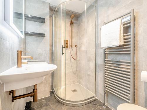 a bathroom with a sink and a shower at Rock House in Wells