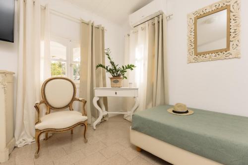 Ένα ή περισσότερα κρεβάτια σε δωμάτιο στο PRETTY SPITI Holiday Home