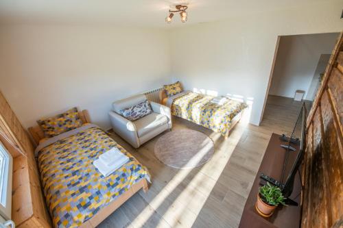 Postel nebo postele na pokoji v ubytování Apartmani Nada