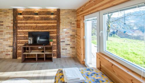 TV a/nebo společenská místnost v ubytování Apartmani Nada