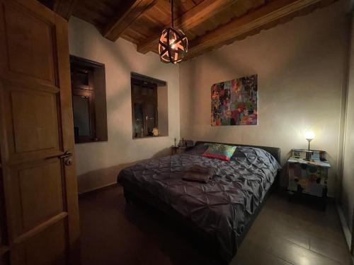 Postel nebo postele na pokoji v ubytování Patrimonium Wellness Apartments