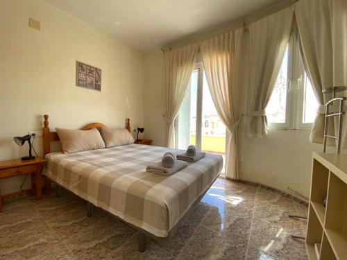 Giường trong phòng chung tại Casa Pelican