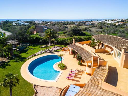 an aerial view of a villa with a swimming pool at Villa Eagles Nest by Algarve Vacation in Albufeira