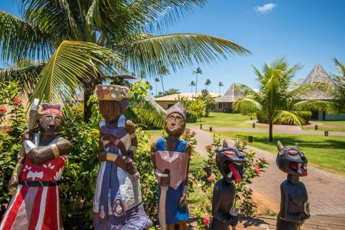 a group of statues of people standing in a park at Vila Galé Resort Marés - All Inclusive in Guarajuba
