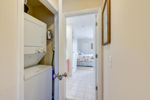 a hallway with a door leading to a bedroom at North Myrtle Beach Condo Community Pool and Hot Tub in Myrtle Beach