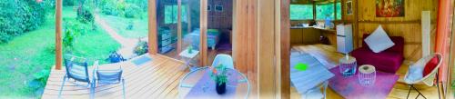 an aerial view of a living room with a balcony at Mindo Eco Suite con Rio y Cascada in Mindo