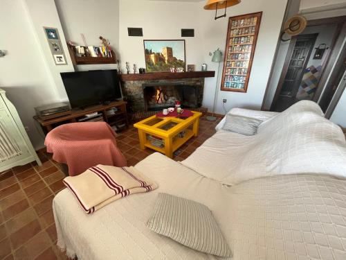 Postel nebo postele na pokoji v ubytování Casa Julia y Chloé