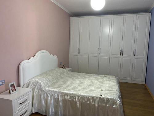 Postel nebo postele na pokoji v ubytování Vila Kani