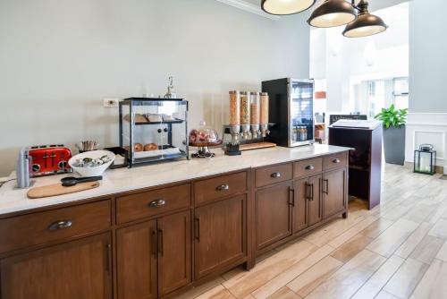 a kitchen with a large counter with a fish tank at Shutters Hotel in Elko