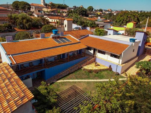 an overhead view of a house with an orange roof at Canto do Rio Pousada in Vargem Bonita