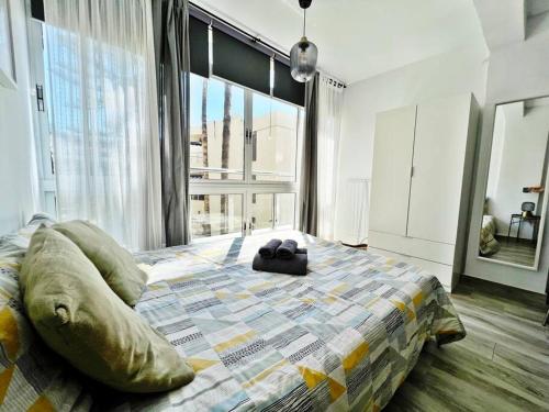 Ένα ή περισσότερα κρεβάτια σε δωμάτιο στο Céntrico y nuevo estudio fuengirola