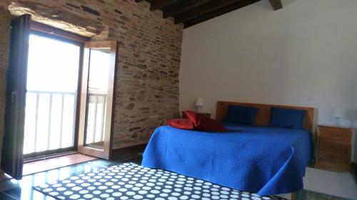 Katil atau katil-katil dalam bilik di Casas de Campo da Quinta Entre Rios
