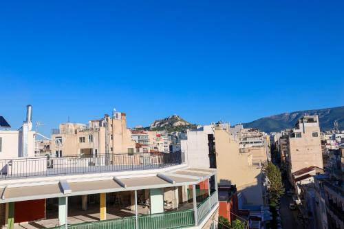 a view of a city with tall buildings at PANORAMIC SUITE in Athens