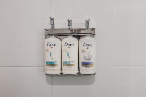 a group of three white gas cylinders on a shelf at Holiday Inn Express Toronto-North York by IHG in Toronto
