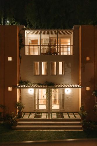 a building at night with its lights on at La Posada del Puente in Arequipa