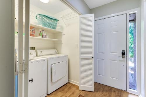 a laundry room with a washer and dryer at 3322 Fairway Oaks in Amelia Island