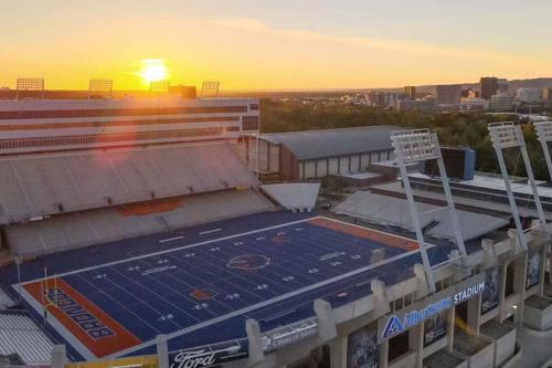 an aerial view of a football stadium at sunset at Navy Nights & Scenic Feels - Sleek Studio Stay in Boise