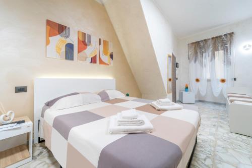Postel nebo postele na pokoji v ubytování B&B Eraclio