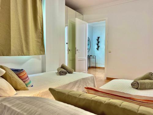 Katil atau katil-katil dalam bilik di Bañaderos by SunHousesCanarias
