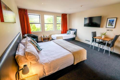 Postel nebo postele na pokoji v ubytování Coleraine Suites & Apartments