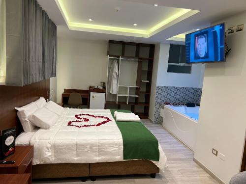 Cama ou camas em um quarto em EL ALAMO, EJECUTIVO Y SPA