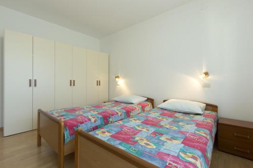 Posteľ alebo postele v izbe v ubytovaní Apartment Vesna Opatija free parking