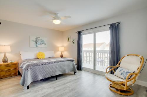 a bedroom with a bed and a chair and a window at Remodeled Ocean City Getaway with Harbor Views! in Ocean City
