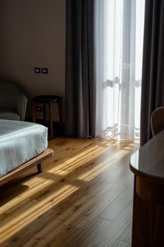 Lo Stemma Luxury Boutique Hotelにあるベッド