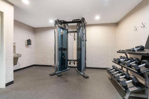 a gym with tread machines in a room at Best Western Bend North in Bend